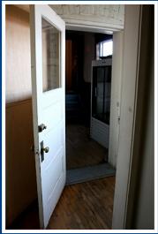 DOOR FROM KITCHEN TO HALL AND BOARD ROOM